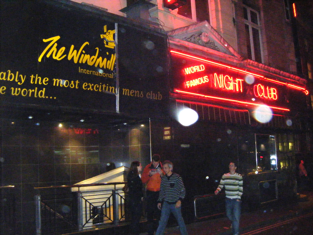 The Windmill Theatre frontage in Soho with red neon signs, photographed in 2009